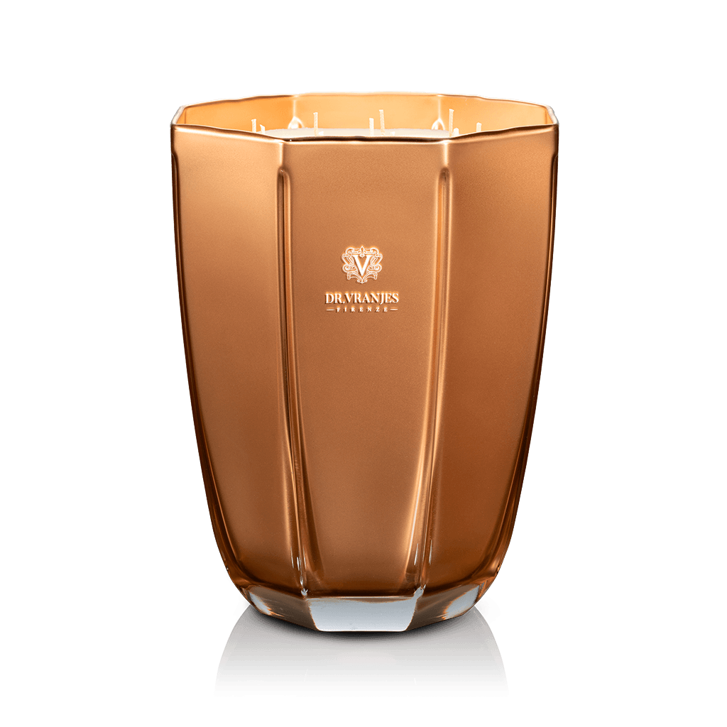 Eclectic Dr. Vranjes Oud Nobile scented candle in a luxurious faceted gold glass vase on a black background.