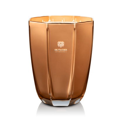 Eclectic Dr. Vranjes Oud Nobile scented candle in a luxurious faceted gold glass vase on a black background.