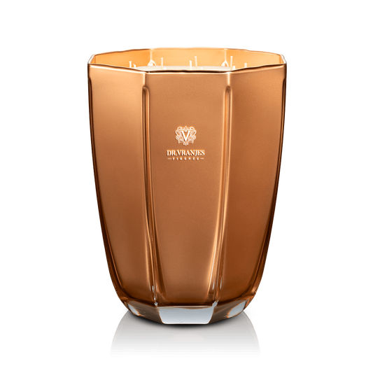 Eclectic Dr. Vranjes Oud Nobile scented candle in a luxurious faceted gold glass vase on a black background.