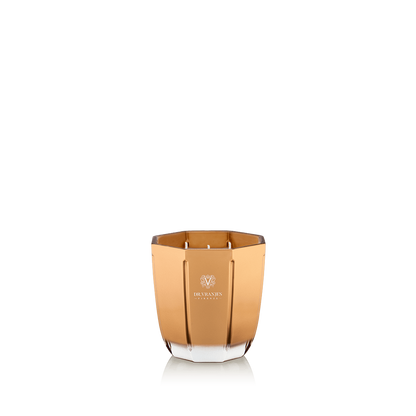 Eclectic Dr. Vranjes Oud Nobile scented candle in a luxurious gold-coloured glass vase against a black background.