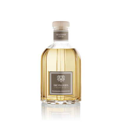 Eclectic Dr Vranjes Leather Oud reed diffuser in an iconic glass bottle with a wooden cap on a white background.