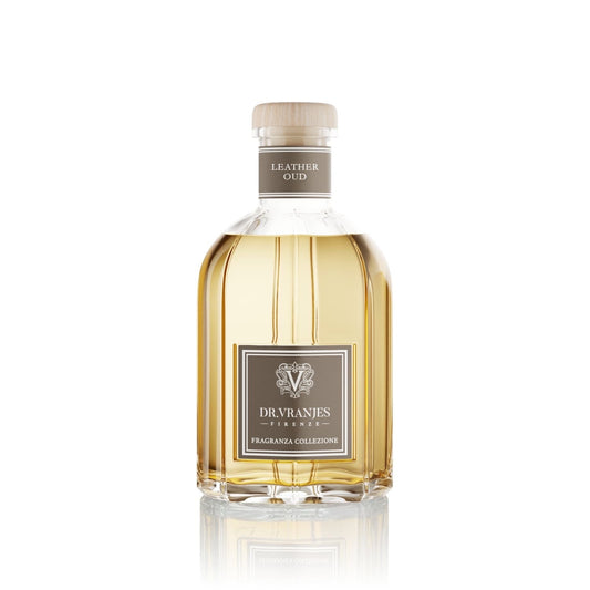 Eclectic Dr Vranjes Leather Oud reed diffuser in an iconic glass bottle with a wooden cap on a white background.