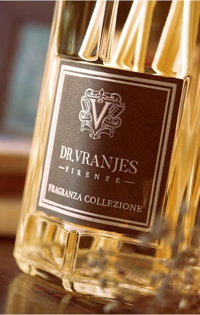 Eclectic Dr Vranjes Leather Oud reed diffuser in a signature glass bottle with a dark label and golden fragrance oil