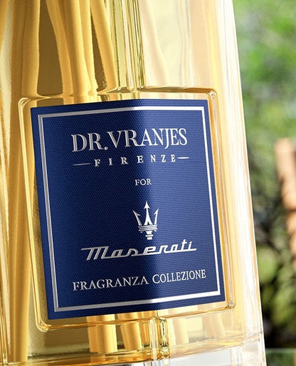 Eclectic Dr Vranjes Maserati reed diffuser in a clear glass bottle with a blue label featuring the Maserati logo