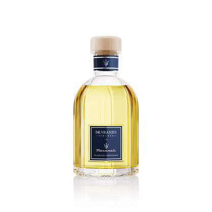Eclectic Dr Vranjes Maserati reed diffuser in a clear glass bottle with a blue label and light wood cap.