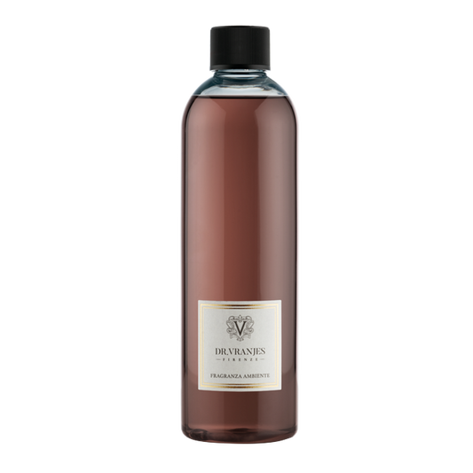 Eclectic Dr Vranjes Melograno diffuser refill bottle with deep red pomegranate fragrance liquid on black background