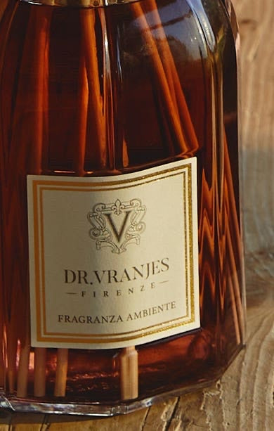 Eclectic Dr Vranjes Melograno reed diffuser in a faceted amber glass bottle with natural fragrance sticks