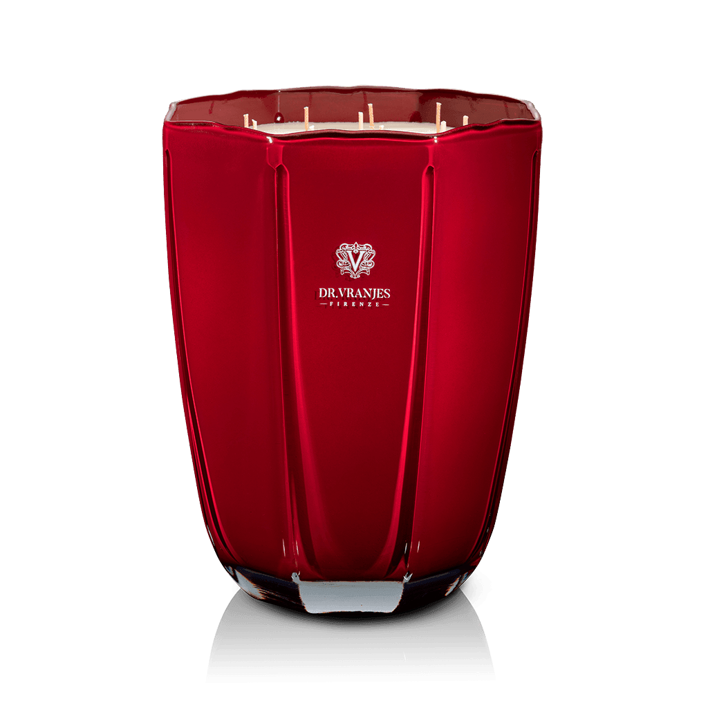 Eclectic Dr. Vranjes Melograno scented candle in a faceted tourmaline-coloured glass vase with multiple wicks.
