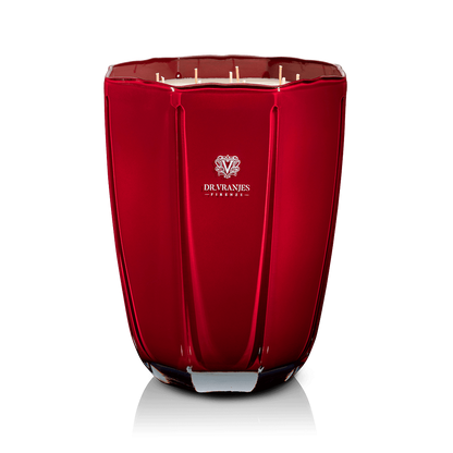 Eclectic Dr. Vranjes Melograno scented candle in a faceted tourmaline-coloured glass vase with multiple wicks.