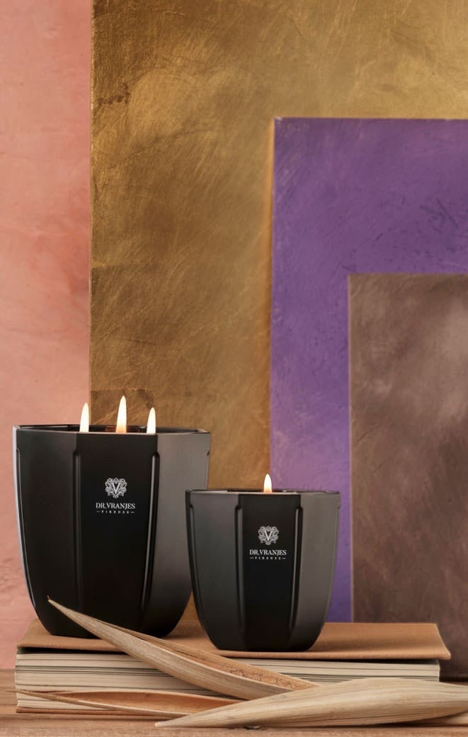 Eclectic Dr. Vranjes Rosa Tabacco scented candles in onyx glass vases with multiple wicks, set against a textured backdrop.