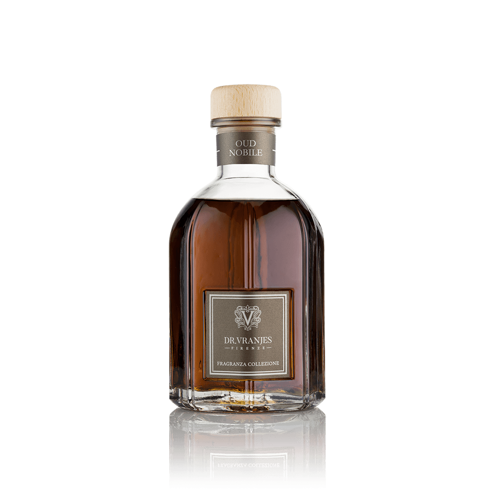 Eclectic Dr Vranjes Oud Nobile reed diffuser in a classic glass bottle with a wooden cap against a black background.