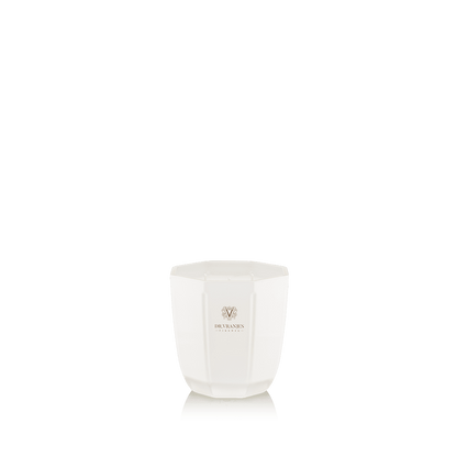 Eclectic Dr Vranjes Ginger Lime scented candle in an elegant pearl-coloured glass vase on a black background.