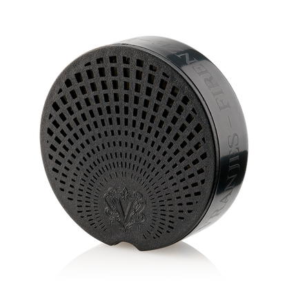 Eclectic Dr Vranjes Rosa Tabacco Carparfum refill in a sleek black circular diffuser case with intricate grille design.