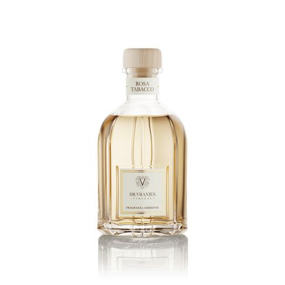 Eclectic Dr Vranjes Rosa Tabacco reed diffuser in a signature glass bottle with a light wooden cap.