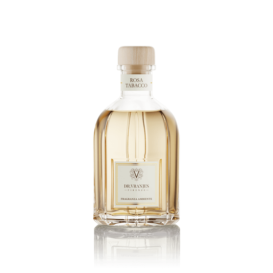 Eclectic Dr Vranjes Rosa Tabacco reed diffuser in a signature glass bottle with a light wooden cap.