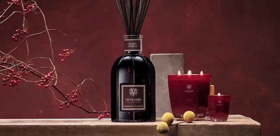 Eclectic Dr. Vranjes Rosso Nobile luxury gift set featuring a 500ml reed diffuser and ruby-red scented candles.