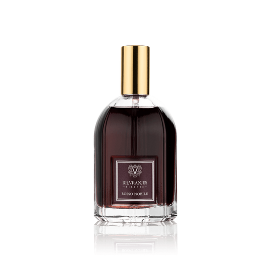 Eclectic Dr. Vranjes Rosso Nobile room spray in a glass bottle with deep burgundy liquid and a gold-toned cap.