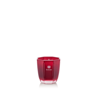 Eclectic Dr. Vranjes Melograno scented candle in a tourmaline-coloured glass vase with a hexagonal design.