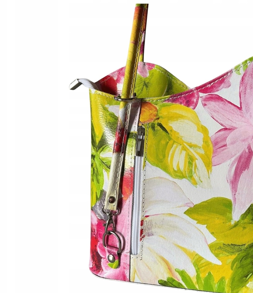 Eclectic Florence floral print genuine leather convertible bag with silver hardware and vertical zip pocket detail.