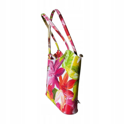 Eclectic floral print leather convertible shoulder bag and backpack with an asymmetric silhouette and silver hardware.