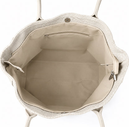 Eclectic Florenza cream suede shopper bag interior with snake-print texture, zip pocket, and magnetic closure.