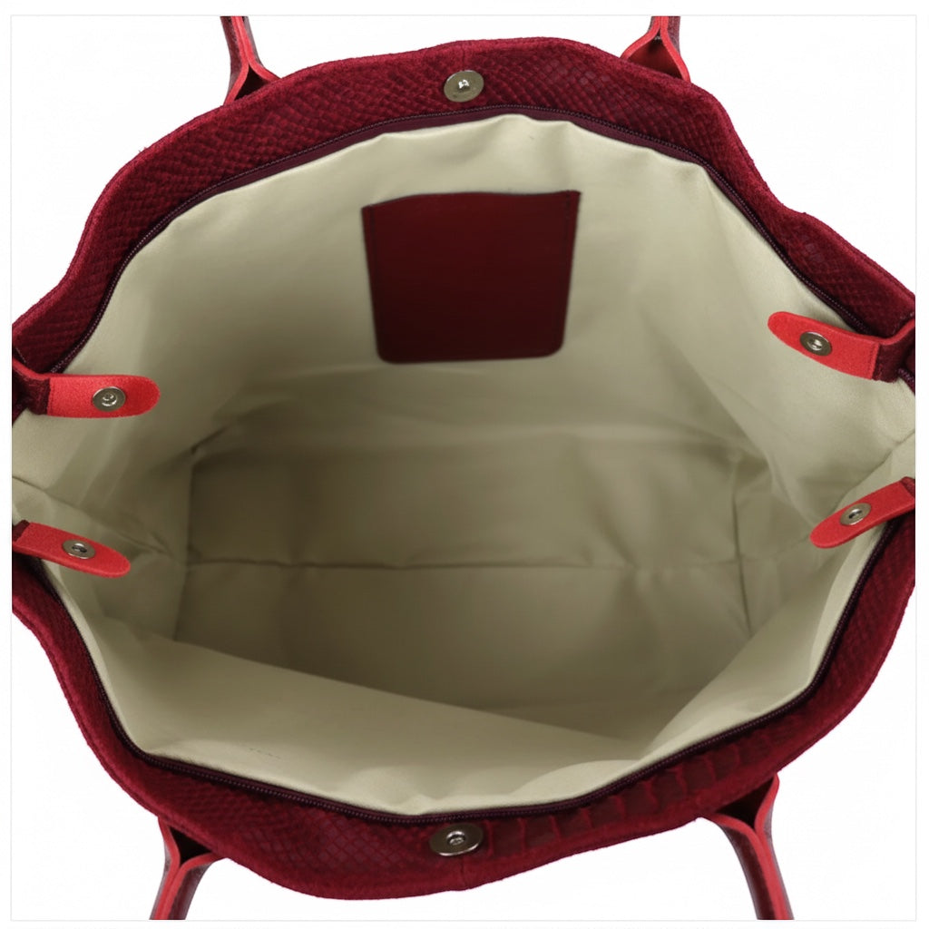 Interior view of the Eclectic Florenza wine suede shopper bag showing the spacious lined compartment and pockets.