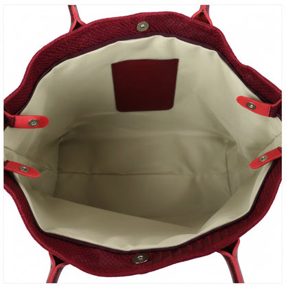 Interior view of the Eclectic Florenza wine suede shopper bag showing the spacious lined compartment and pockets.