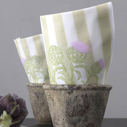 Eclectic Françoise Paviot Artichaut airlaid napkins with green botanical artichoke print and stripes in stone pots