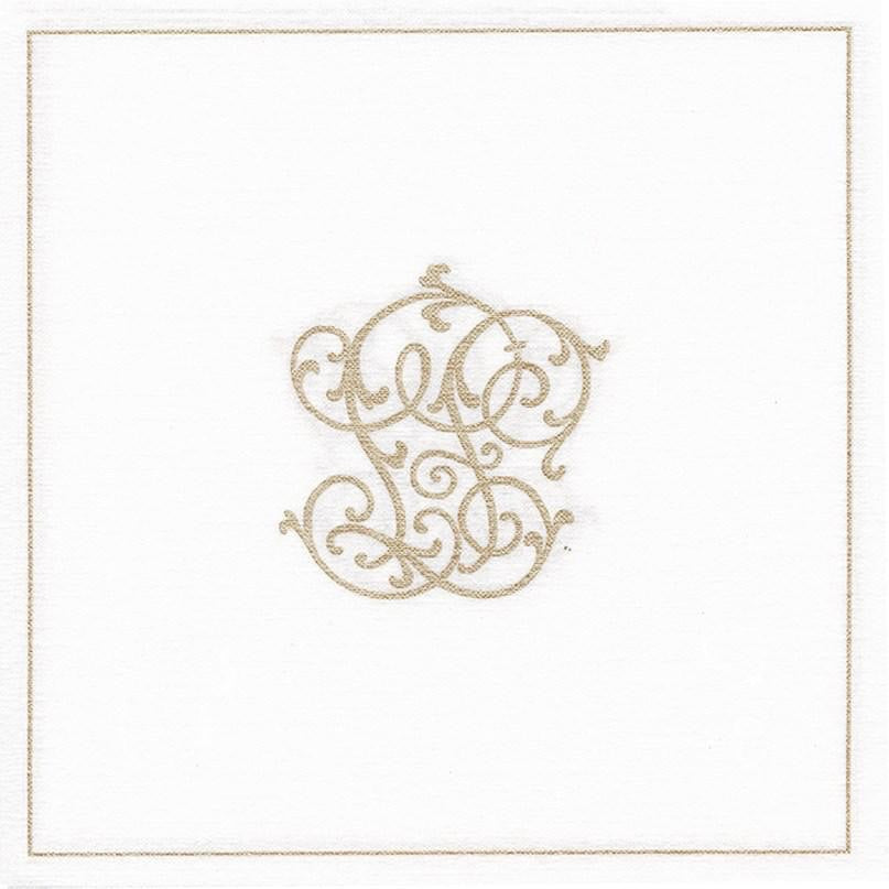 Eclectic Françoise Paviot Chiffre Or dinner napkin in white airlaid material with an elegant gold monogram design.