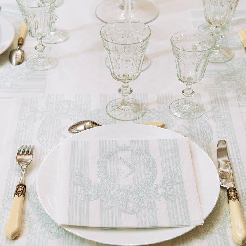 Eclectic Françoise Paviot Madame Vert airlaid dinner napkin with green wreath motif on a formal table setting