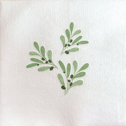 Eclectic Françoise Paviot Olivier dinner napkin featuring a delicate green olive branch print on textured greige airlaid