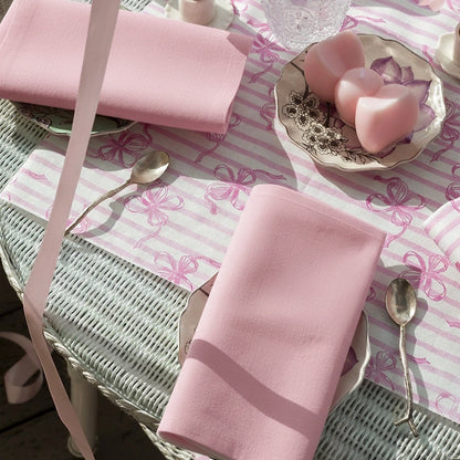 Eclectic Françoise Paviot rose dinner napkins in soft blush airlaid material on a decorated table setting