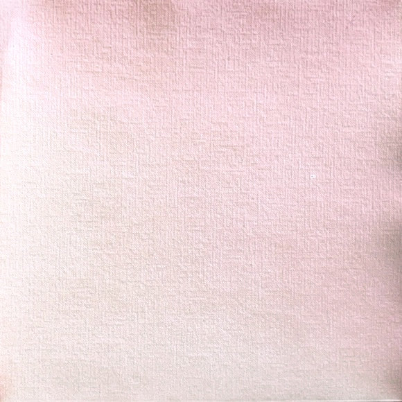 Eclectic Françoise Paviot rose dinner napkin featuring a soft blush tone and a textured linen-like airlaid finish.