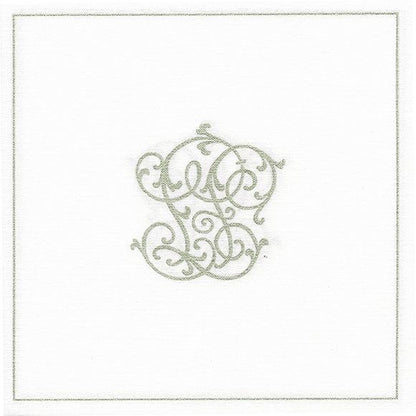 Eclectic Françoise Paviot Chiffre Argent dinner napkin featuring a white airlaid base with a silver monogram motif.