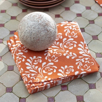 Eclectic Françoise Paviot Arabesque Terra dinner napkins with white floral pattern on terracotta airlaid material