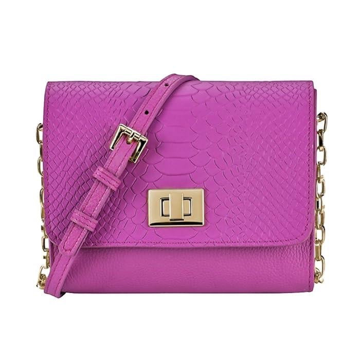 Eclectic Gigi New York orchid leather crossbody bag with snake-embossed flap, gold turn-lock, and chain-detail strap.