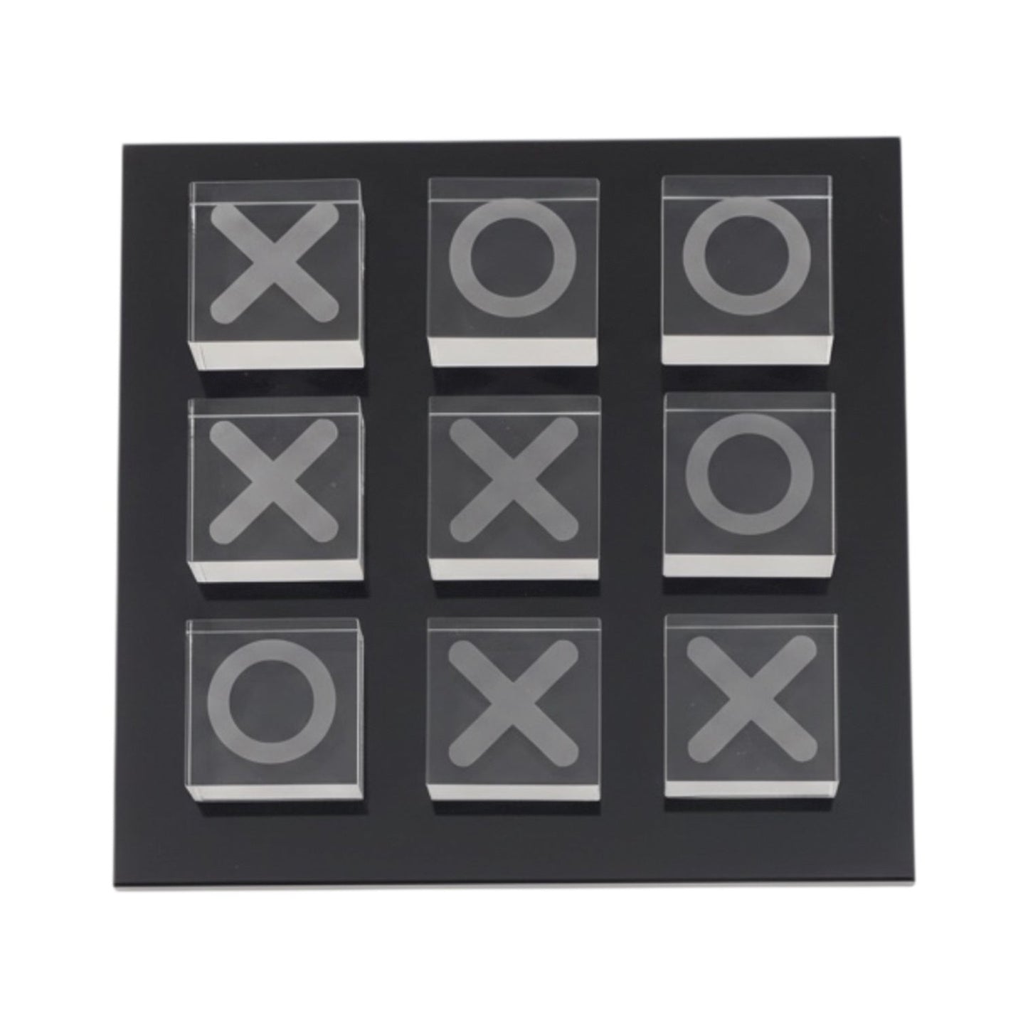 Eclectic glass noughts and crosses game with clear glass pieces on a sleek black square base for modern home decor.