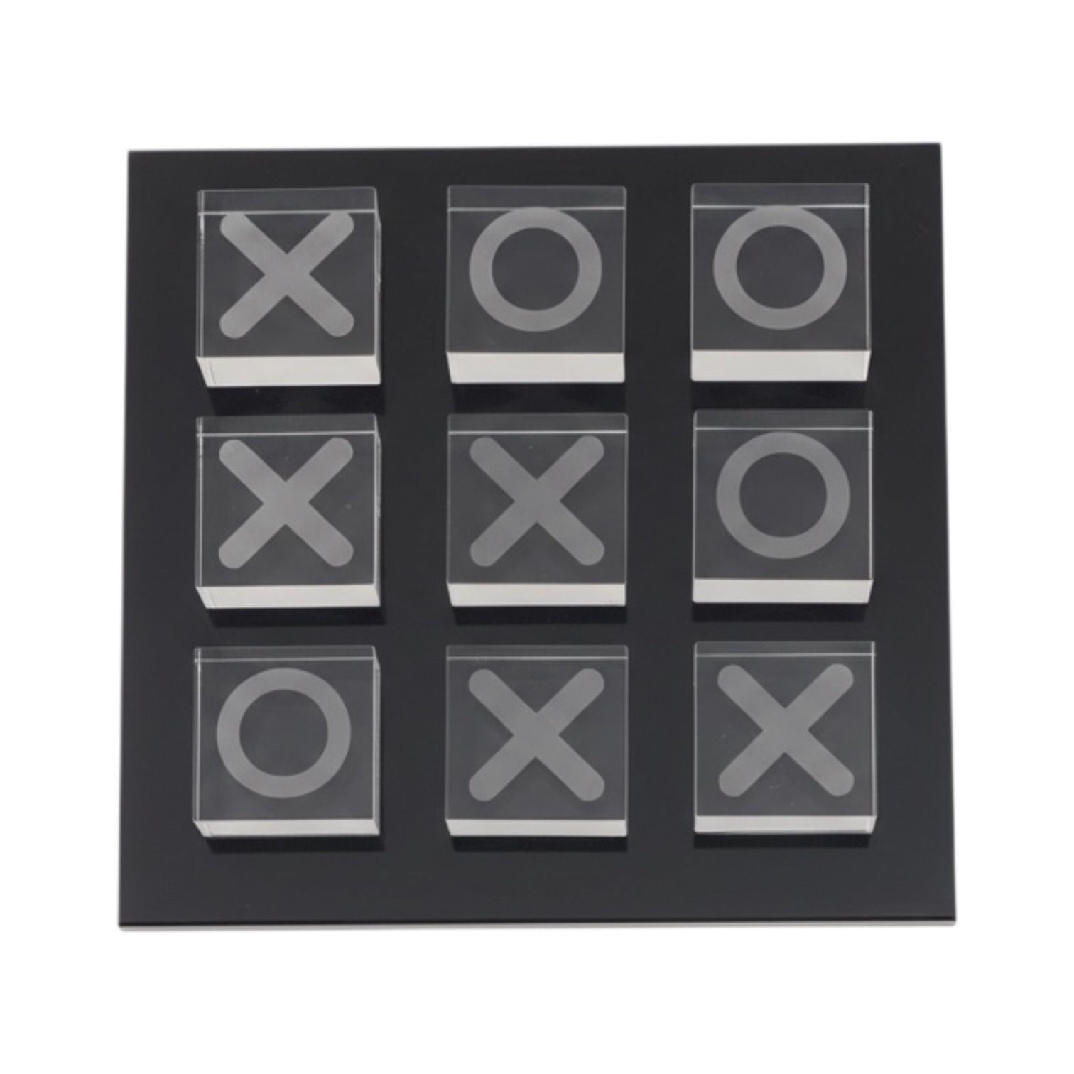 Eclectic glass noughts and crosses game with clear glass pieces on a sleek black square base for modern home decor.