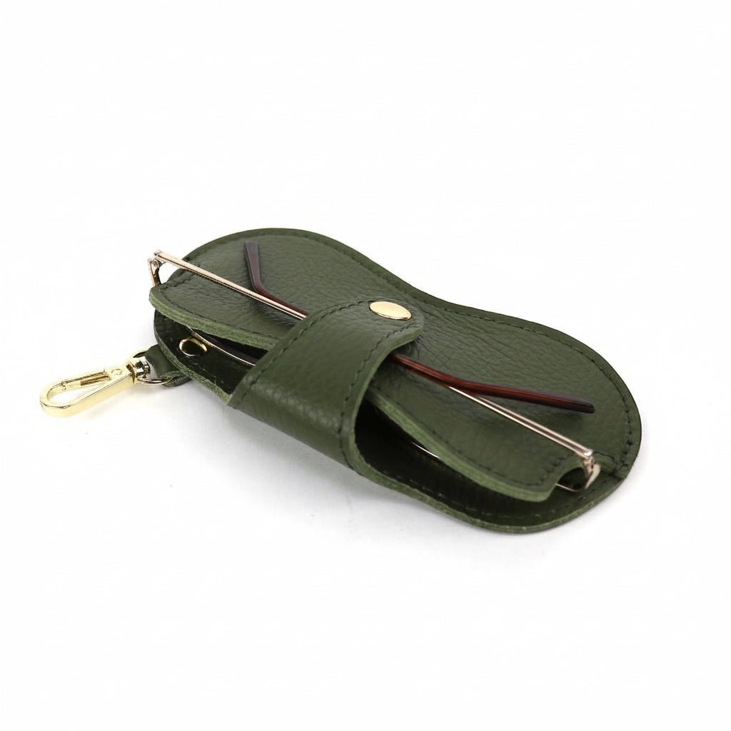 Eclectic green leather glasses case with gold-tone clip and snap-button closure for secure eyewear storage.
