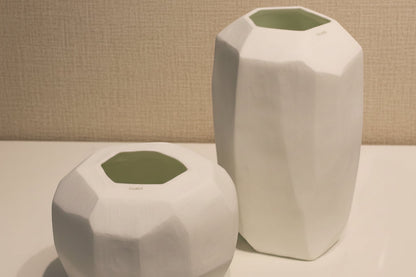 Eclectic Guaxs Cubistic opal white glass vases with faceted hand-cut surfaces in tall and short sizes