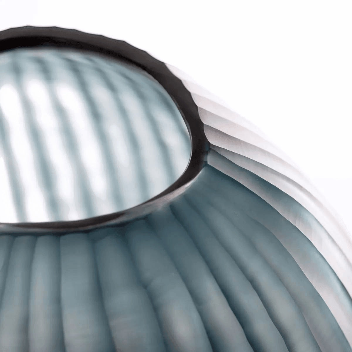Eclectic Guaxs Patara ocean blue mouth-blown glass vase with hand-cut pleated texture and rounded sculptural form