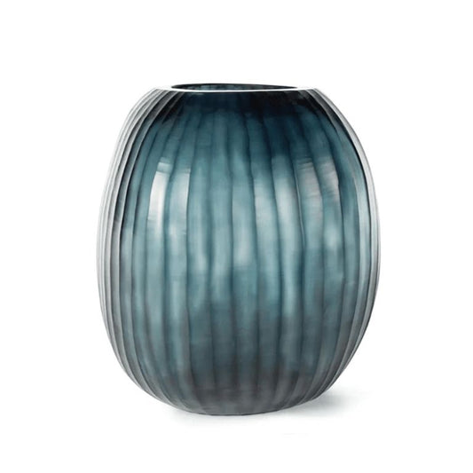 Eclectic Guaxs Patara round mouth-blown glass vase in ocean blue with a hand-cut pleated texture.