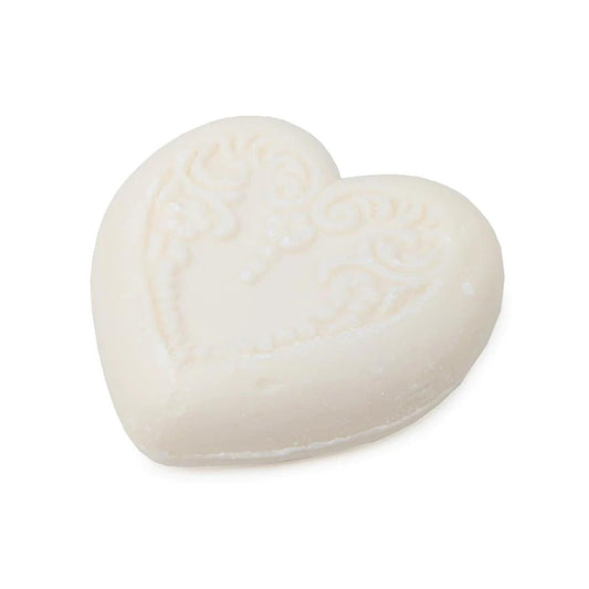 Eclectic heart-shaped ivory vegetable-based soap with embossed floral detailing and a fresh bergamot and lemon scent.