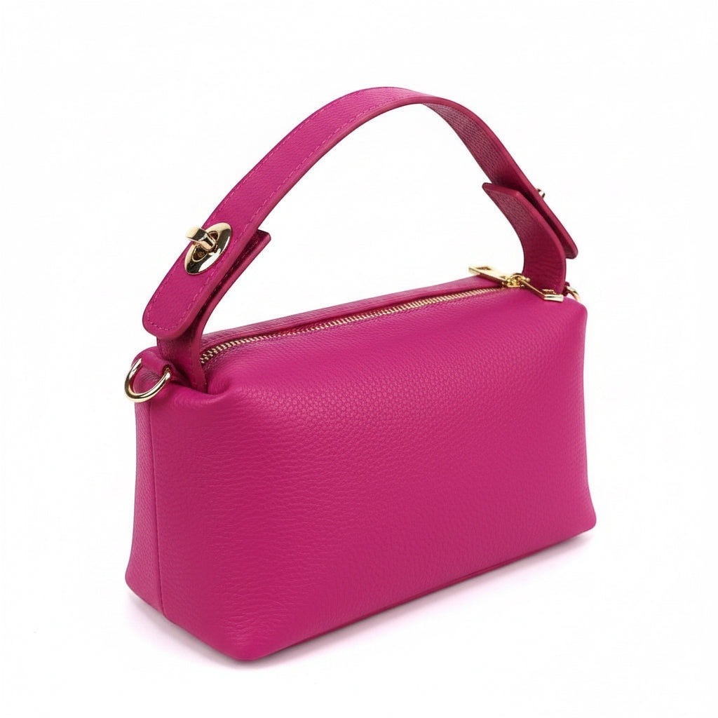 Eclectic hot pink pebbled Italian leather top handle bag with gold-tone twist-lock hardware and zip closure.