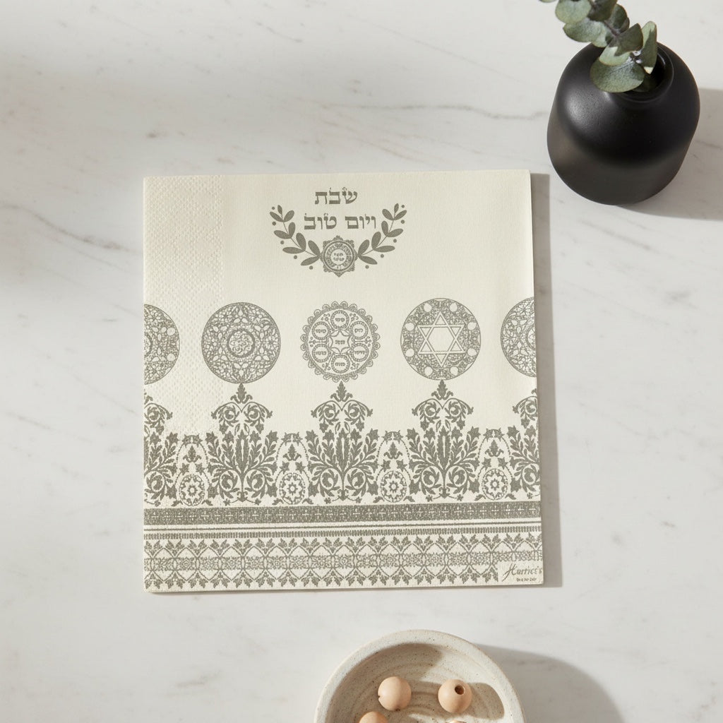 Eclectic Jewish Heritage silver and white airlaid disposable napkins with intricate ornamental and symbolic motifs.