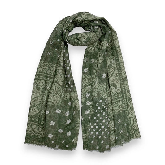 Eclectic khaki wool blend scarf featuring an oversized white bandana paisley print and soft frayed edges.