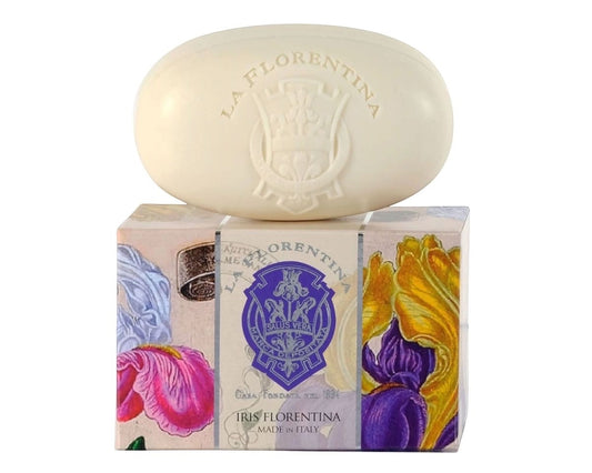 Eclectic La Florentina Iris soap bar in soft ivory resting on its decorative floral gift box.