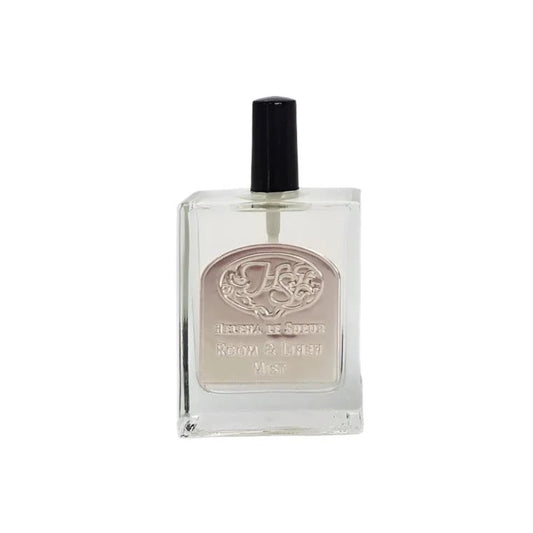 Eclectic La Provence bergamot and lemon room and linen mist in a clear square glass bottle with a pewter emblem.