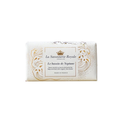 Eclectic La Savonnerie Royale Le Bassin de Neptune soap bar in elegant white packaging with gold fleur-de-lys detailing.