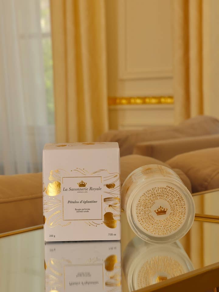 Eclectic La Savonnerie Royale Petales d'Eglantine rose scented candle in an ornate glass jar with its white box.